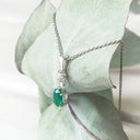 Oval Emerald and Double Diamond Pendant