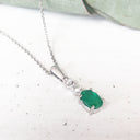 Oval Emerald and Double Diamond Pendant