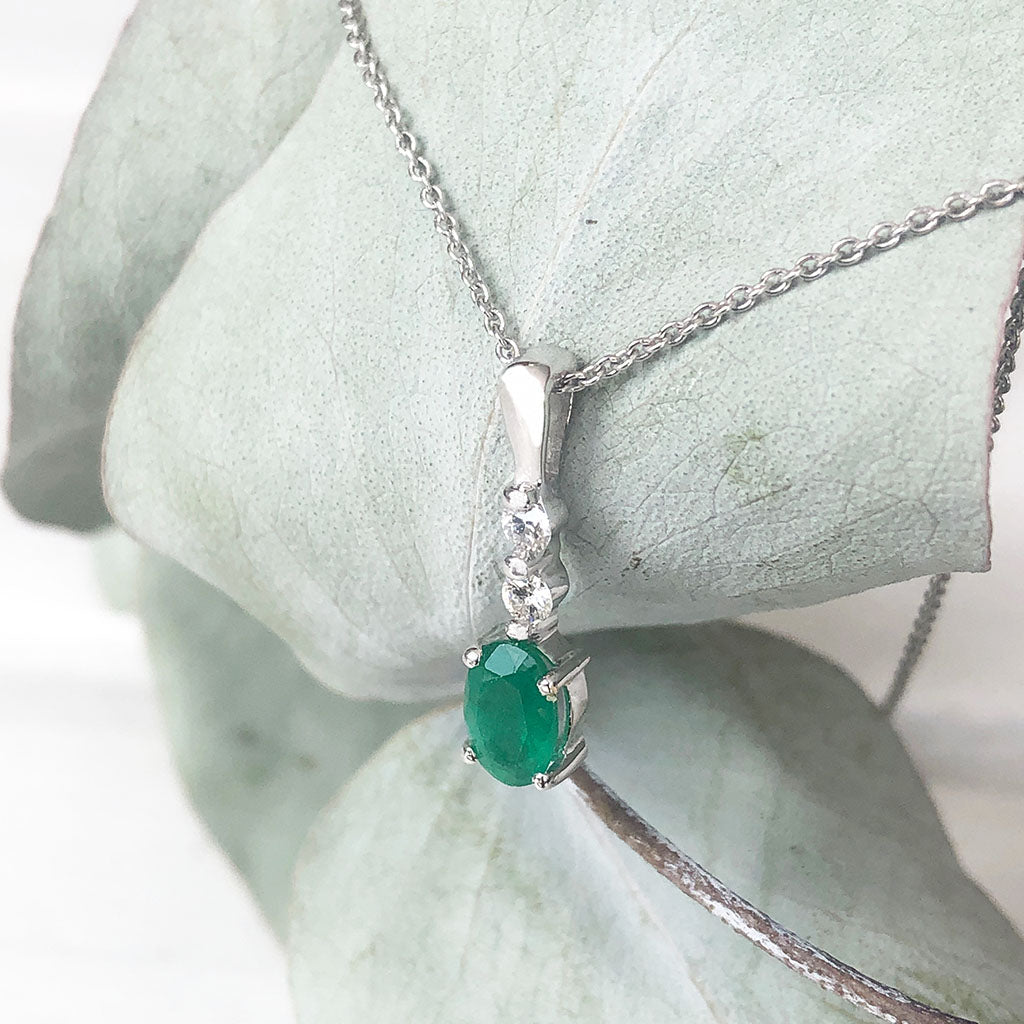 Oval Emerald and Double Diamond Pendant
