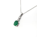 Oval Emerald and Double Diamond Pendant