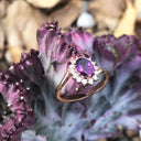 Oval Grape Garnet and Diamond Halo ring