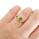 Oval Peridot Ring With Diamond Half Infinity Twist Shoulders