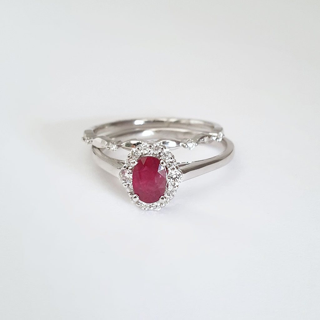 Oval Ruby and Diamond Halo Engagement Ring with Diamond Crimped Wedding Band Set