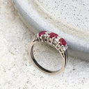 Oval Ruby and Double Diamond Accented Ring