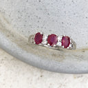 Oval Ruby and Double Diamond Accented Ring