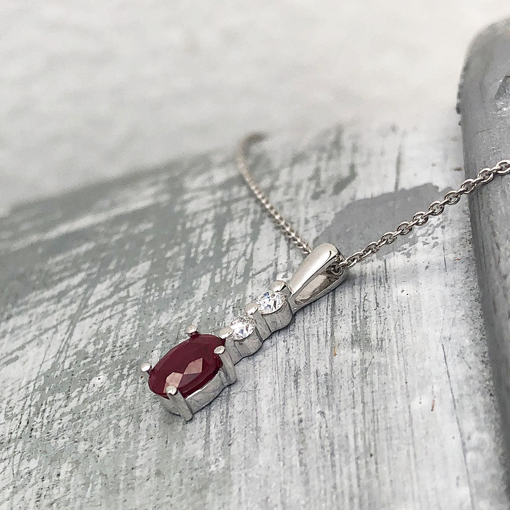 Oval Ruby and Double Diamond Pendant