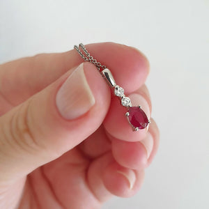 Oval Ruby and Double Diamond Pendant