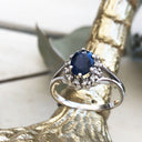 Oval Sapphire and Diamond Halo Ring