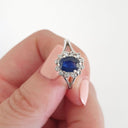 Oval Sapphire and Diamond Halo Ring
