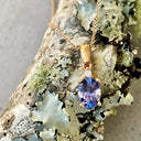 Oval Cut Tanzanite and Petite Diamond Highlight Pendant