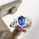 Oval Tube Set Tanzanite with Trilogy Diamond Shoulder White Gold Ring