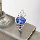 Oval Tube Set Tanzanite with Trilogy Diamond Shoulder White Gold Ring