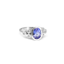 Oval Tube Set Tanzanite with Trilogy Diamond Shoulder White Gold Ring