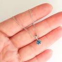 Elegant Round Cut Blue Topaz Pendant and Chain