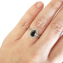 Pear Cut Black Diamond with White Diamond Halo