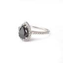 Pear Cut Black Diamond with White Diamond Halo