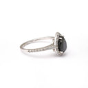 Pear Cut Black Diamond with White Diamond Halo