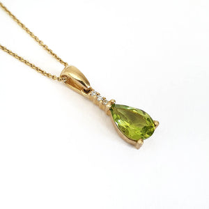 Pear Cut Peridot and Accent Diamond Drop Pendant