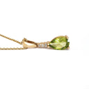 Pear Cut Peridot and Accent Diamond Drop Pendant
