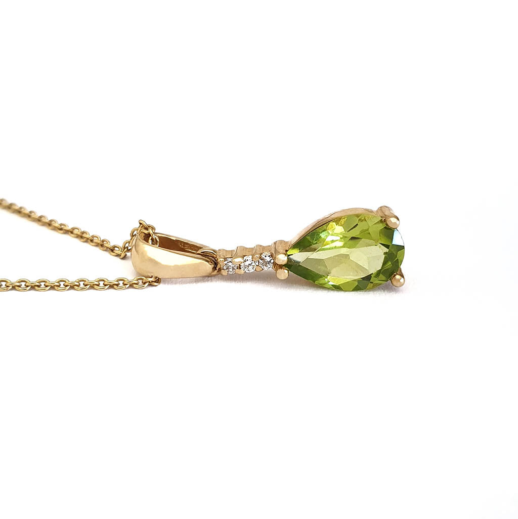 Pear Cut Peridot and Accent Diamond Drop Pendant