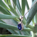 Pear Cut Tanzanite with Diamond Halo Pendant