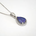 Pear Cut Tanzanite with Diamond Halo Pendant