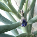 Pear Cut Tanzanite with Diamond Halo Pendant