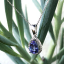 Pear Cut Tanzanite with Diamond Halo Pendant