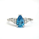 Pear Cut Topaz Ring with Diamond Trilogy Accents