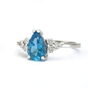 Pear Cut Topaz Ring with Diamond Trilogy Accents