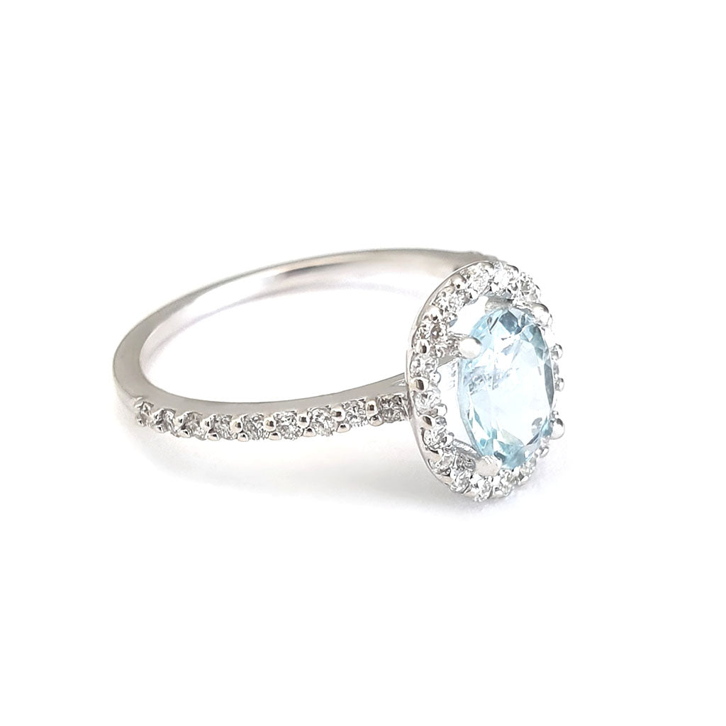 Petite Aquamarine Oval Cut Ring with Halo Diamond accents