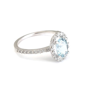 Petite Aquamarine Oval Cut Ring with Halo Diamond accents