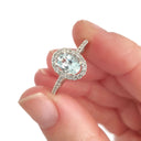 Petite Aquamarine Oval Cut Ring with Halo Diamond accents