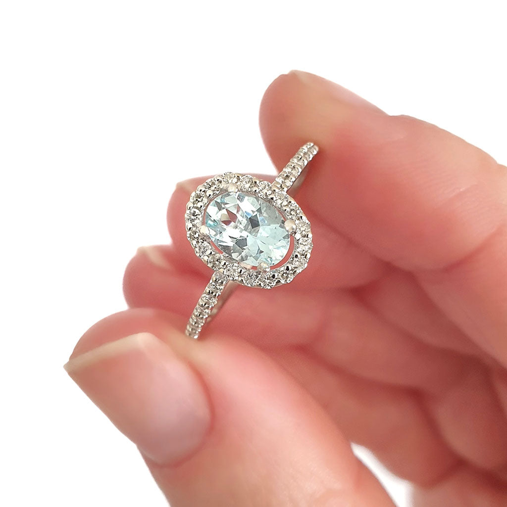 Petite Aquamarine Oval Cut Ring with Halo Diamond accents