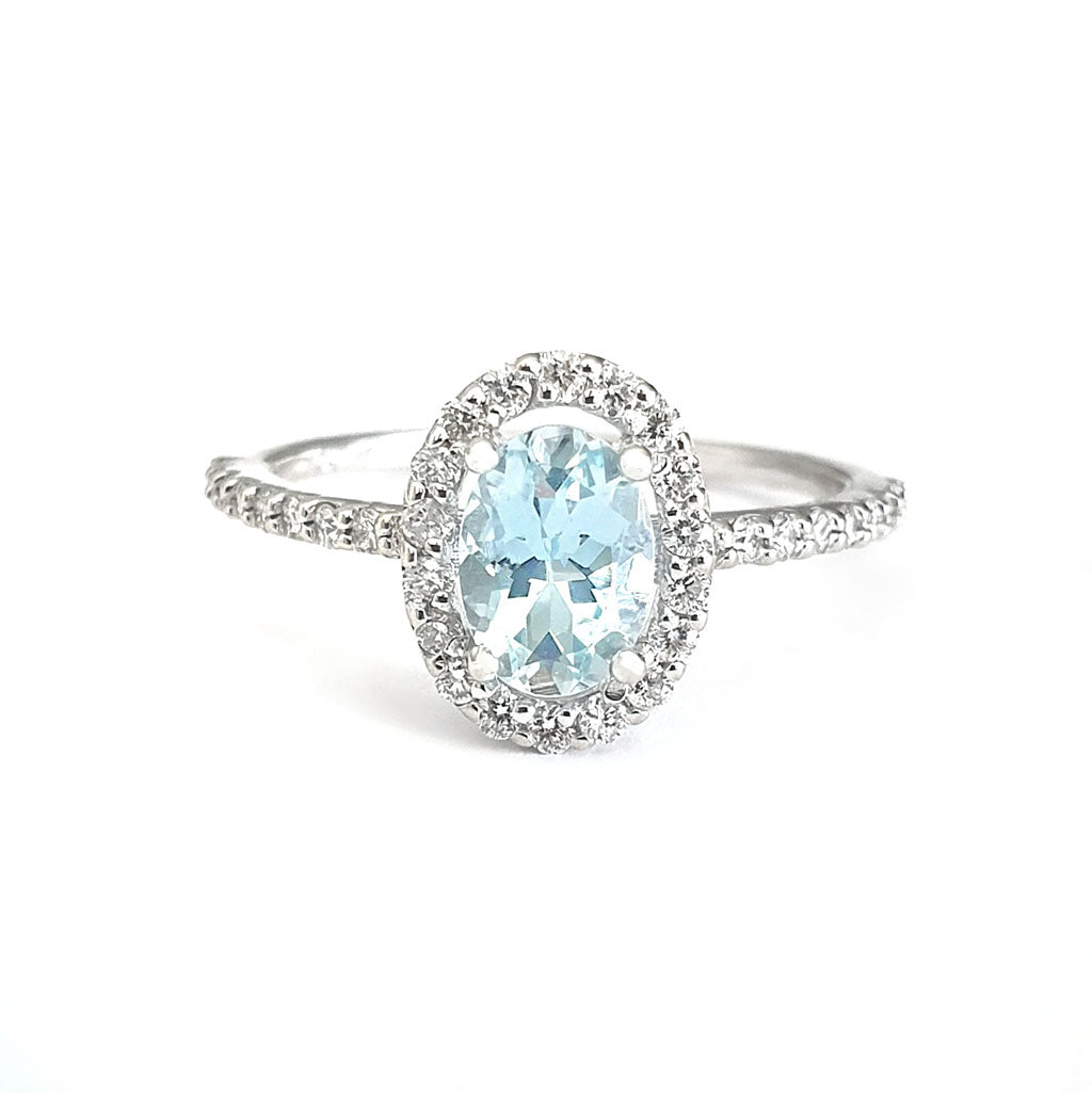 Petite Aquamarine Oval Cut Ring with Halo Diamond accents