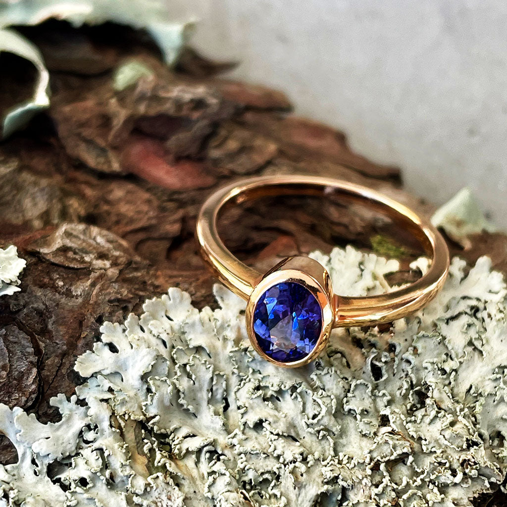 Petite Bezel Set Oval Cut Tanzanite Rose Gold Ring