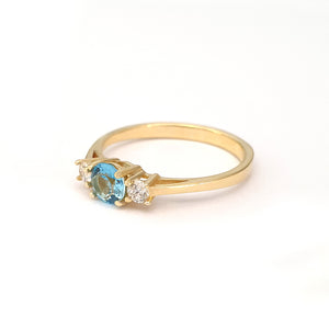 Petite Blue Topaz and Diamond Trilogy Yellow Gold Ring
