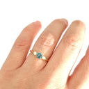 Petite Blue Topaz and Diamond Trilogy Yellow Gold Ring