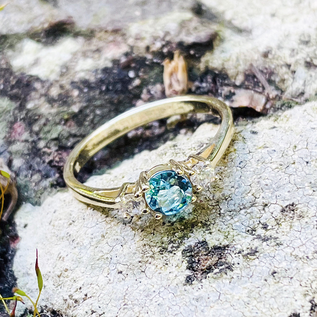 Petite Blue Topaz and Diamond Trilogy Yellow Gold Ring