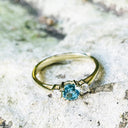 Petite Blue Topaz and Diamond Trilogy Yellow Gold Ring