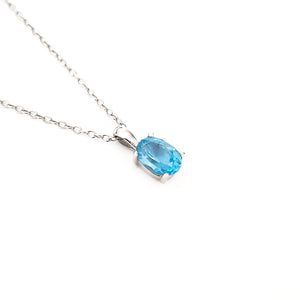 Petite Oval Cut Blue Topaz Pendant