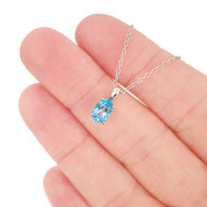 Petite Oval Cut Blue Topaz Pendant