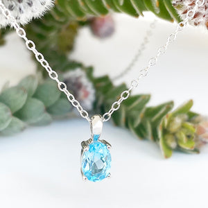 Petite Oval Cut Blue Topaz Pendant