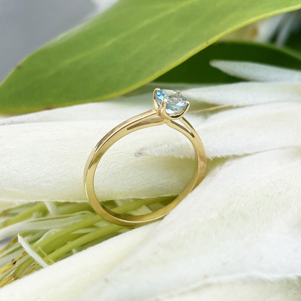 Petite Solitaire Aquamarine Round Cut Four Claw Ring