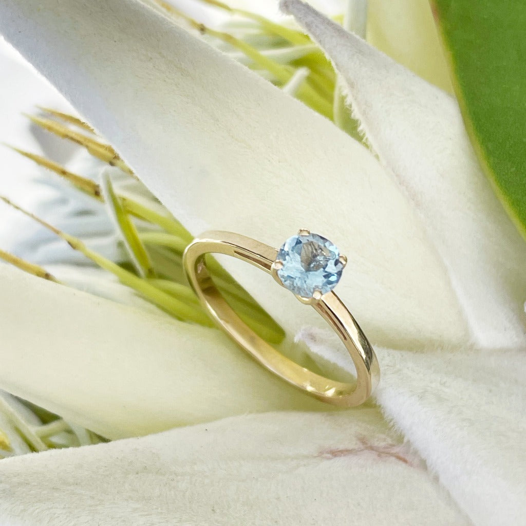 Petite Solitaire Aquamarine Round Cut Four Claw Ring