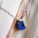 Handcrafted Cushion Cut Tanzanite Pendant with Tube Set Diamond Accent