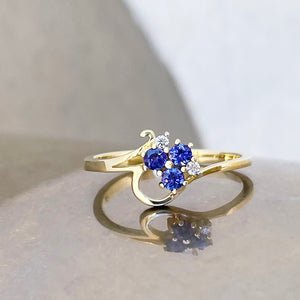 Playful Tanzanite and Diamond Yellow Gold Ring