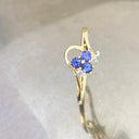 Playful Tanzanite and Diamond Yellow Gold Ring