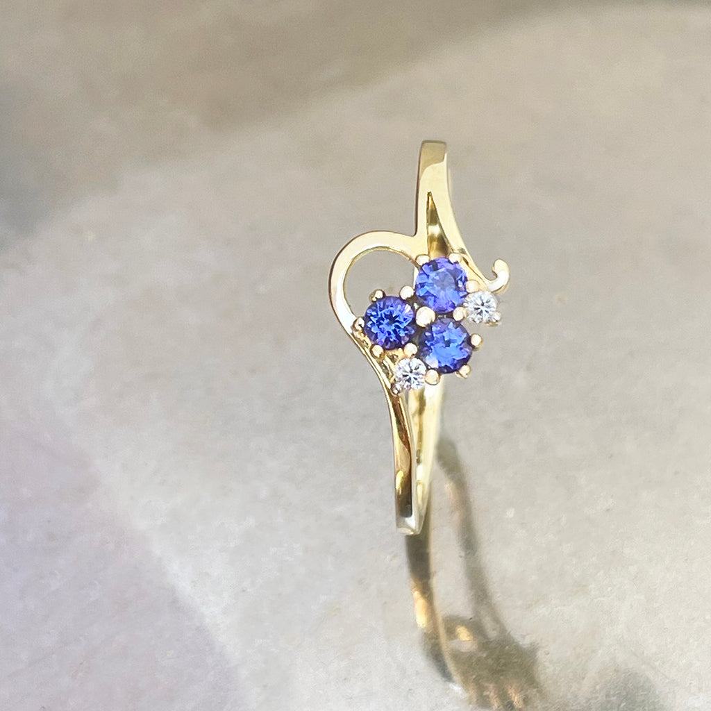 Playful Tanzanite and Diamond Yellow Gold Ring