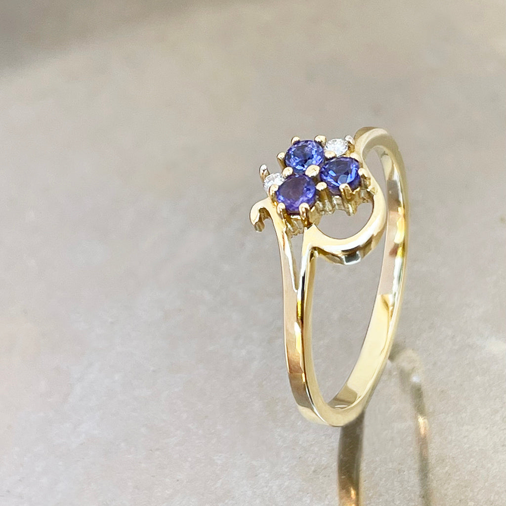 Playful Tanzanite and Diamond Yellow Gold Ring